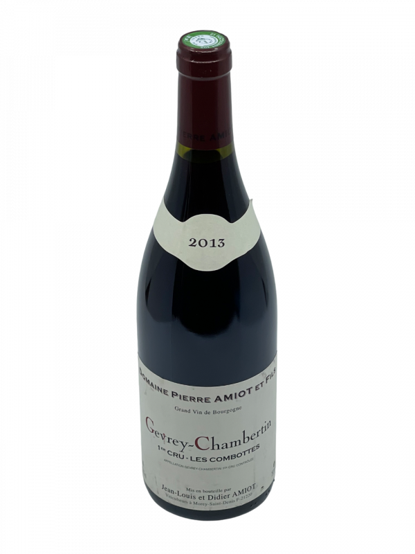 Bourgogne Gevrey Chambertin Premier cru Les Combottes Domaien Amiot Père et Fils appellation climat terroir propriété familiale exploitation vignoble superficie hectare parcelle vigne vin rouge Grand Cru Latricières Chambertin Mazoyères Chambertin Clos de la Roche millésime nez bouche attaque finale note arôme bouquet palais palette aromatique couleur robe reflets fantastique corpulent tanin soyeux distinction fruits rouges noirs rose séchée épice douce chair envergure structuré concentré parfait puissance séducteur complexité remarquable vieillissement garde cave plénitude maturité apogée