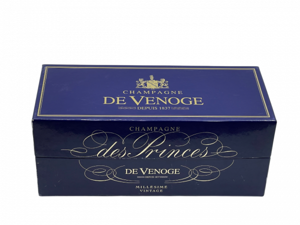 Champagne Brut Millésimé De Venoge Champagne des Princes d’Orange région Épernay international maison expédition qualité élaboration cuvée renommée emblématique renaissance hommage esprit tradition aristocratique flacon bouteille spectaculaire silhouette carafe décanter précieux format vieillissement maturité apogée dégustation grandiose assemblage complexe parfait équilibré millésime nez bouche attaque finale note arôme bouquet palais palette aromatique couleur robe reflets or clair éclatant bulle fine régulière expressif élégant pêche blanche fleurs brioche fruit ample harmonieux chair miel acacia minéralité fraîcheur