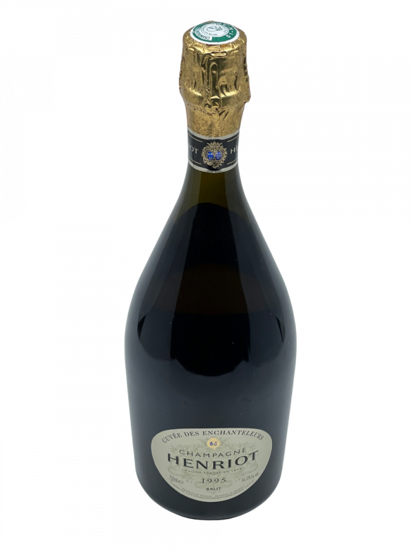Champagne Brut Millésimé henriot cuvée des enchanteleurs maison négoce apolline joseph génération succession transmission savoir-faire tradition modernité collection vigne vin effervescence réserve perpétuelle création précieux histoire séduction conviction assemblage cépage chardonnay pinot noir millésime nez bouche attaque finale note arôme bouquet palais palette aromatique couleur robe reflets équilibre perfection finesse puissance dégustation agrume florale fruit noyaux confit texture généreux opulent miel épice douce vanille minéralité fraîcheur crémeuse potentiel garde vieillissement expression