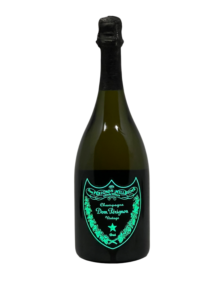 Champagne brut millésimé vintage Moët et Chandon succès commercial renommé planétaire monde mondial Dom Pérignon cuvée prestige Luminous lumineux label maison bouteille flacon meilleures années exceptionnelles secret LVMH propriétaire millésime interprétation ultime unique vendange ensoleillement maturité raisin cour grand assemblage cépage chardonnay pinot noir nez bouche attaque finale note arôme bouquet couleur robe gourmand pralin fruits secs dense tourbe iode vivacité puissance droite richesse étonnante persistante tranchant incisif vieillissement apogée potentiel de garde évolution spirale douceur florale minéralité grisée typique fruité confit végétal fraîcheur incroyable feuille camphrier prolonge épice bois réglisse physique tactile vibrant aromatique construction rythme rupture harmonie innovation création confrontation verticalité minérale présence profonde persistance précise amère iodée saline