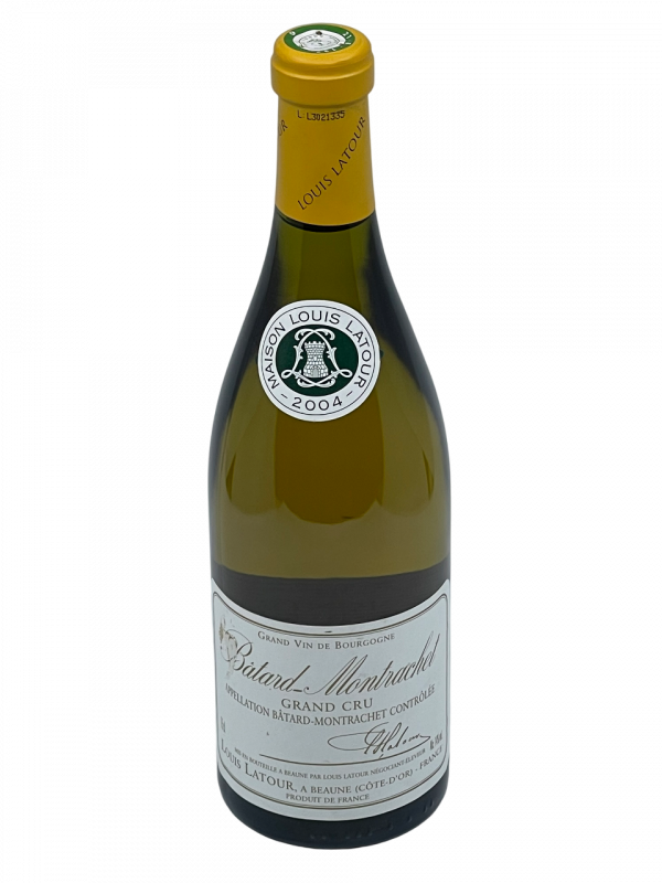 Bourgogne Bâtard Montrachet Grand Cru appellation climat Maison louis latour propriété domaine superficie hectare viticole vigne vin blanc tradition savoir-faire ancestral innovation style reconnaissance réputation mondiale maîtrise cépage chardonnay puligny montrachet chassagne montrachet millésime nez bouche attaque finale note arôme bouquet palais palette aromatique couleur robe reflets brillant floral vanille fumé grillé ample généreuse amande fruit tension finale